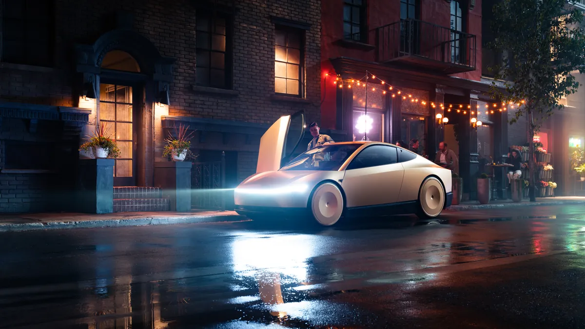 Une passagère monte à bord d’un Tesla Cybercab porte relevée, de nuit, dans une rue commerçante.