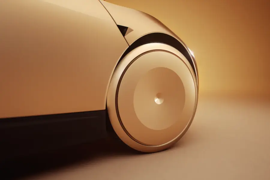Gros plan sur la roue pleine d’un Tesla Cybercab, enjoliveur lisse sans ajour.